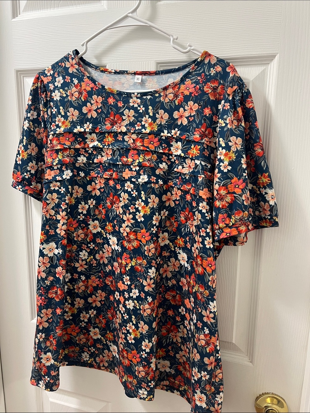 Floral Short-Sleeve Women’s Top in Navy with Coral and Cream Flowers